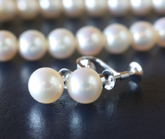 Natural or cultured pearls, precious stones, semi-precious stones, precious metals